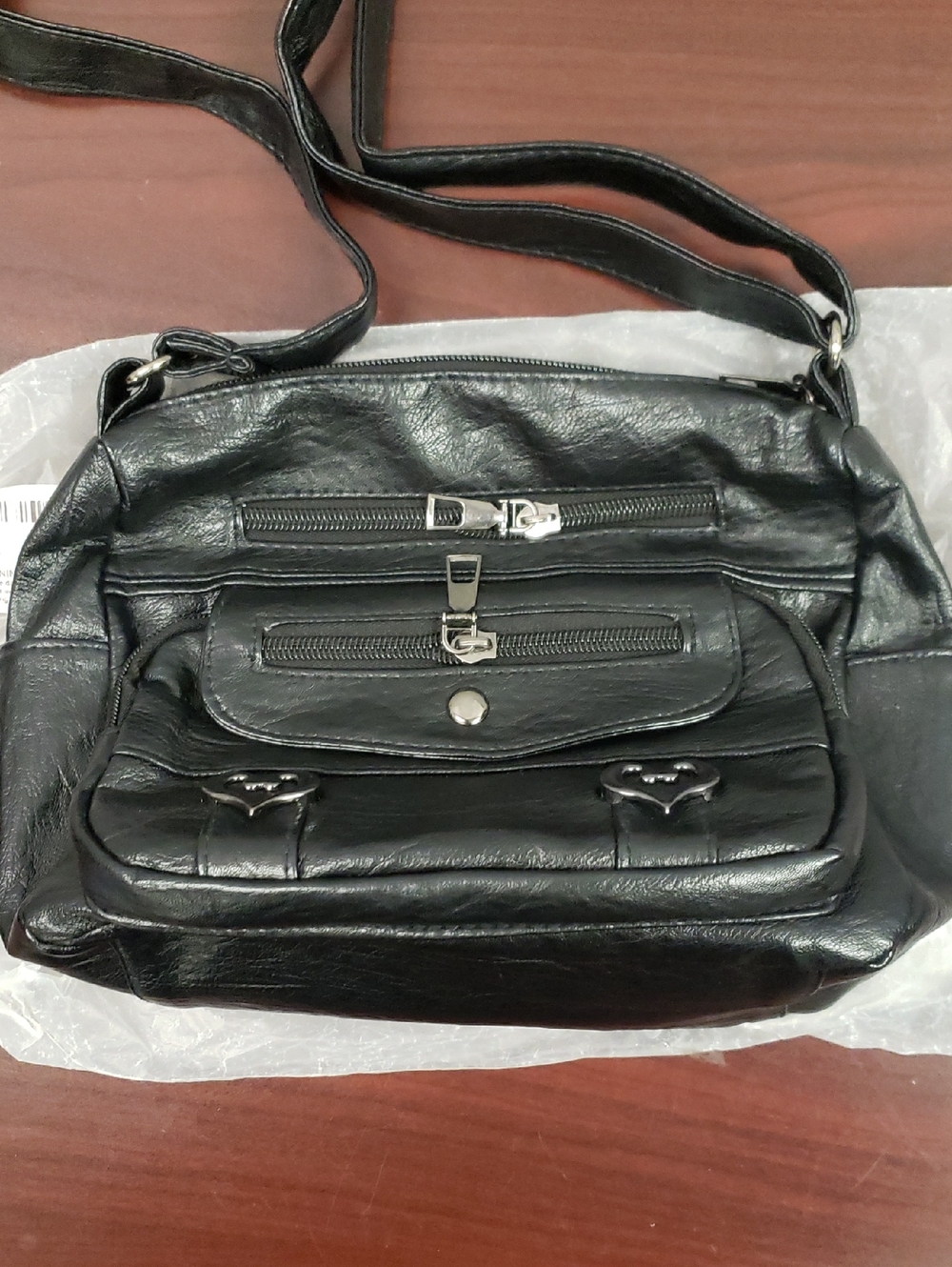 Black Leather Crossbody Bag with Multiple Zippers
